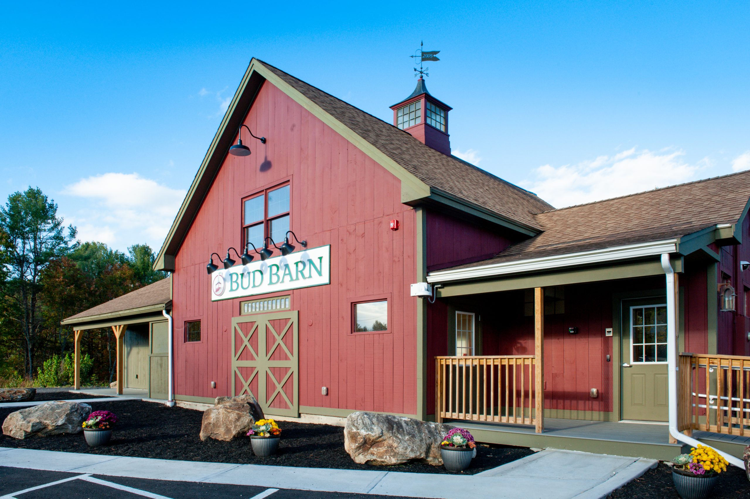 The Bud Barn - exterior of barn building with dispensary logo